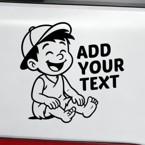 Smiling boy sitting with cap decal